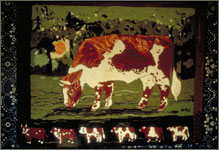 hooked rug featuring cows