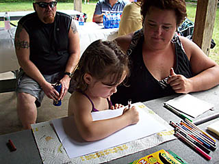 kids coloring at the picnic