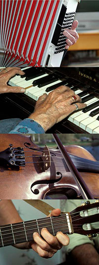 detail of accordion, piano, fiddle, guitar